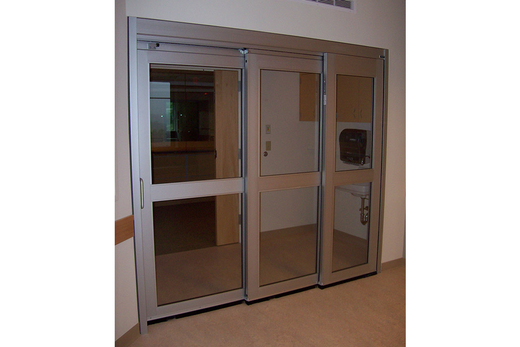 Trackless / Fixed Sidelite Manual Sliding Door NABCO Entrances
